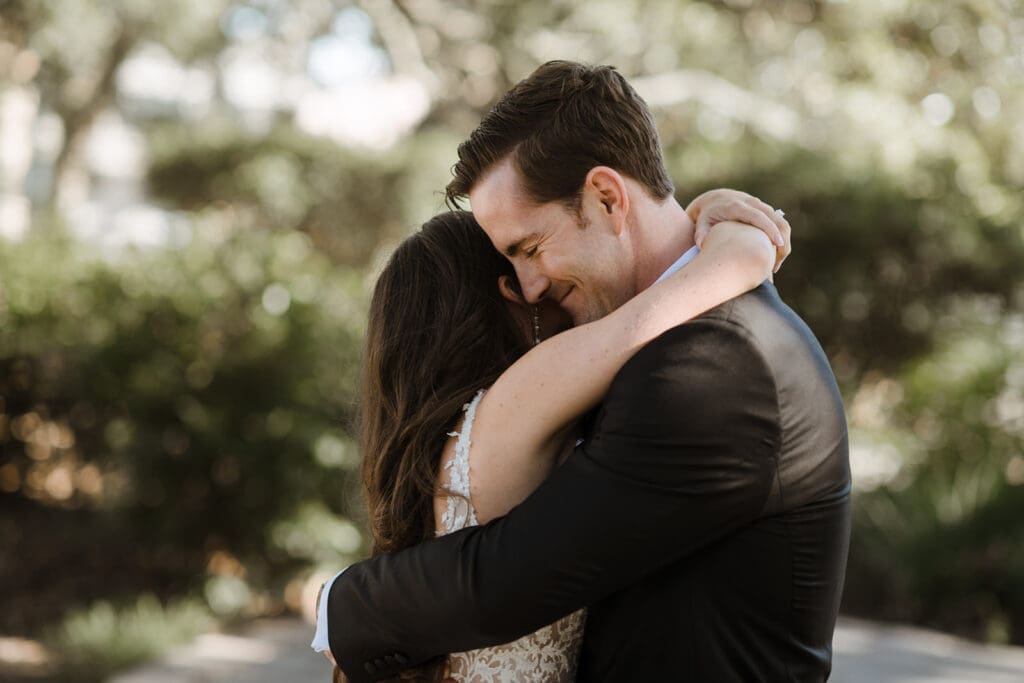 Bride and groom first look captured by a New Orleans wedding videographer.
